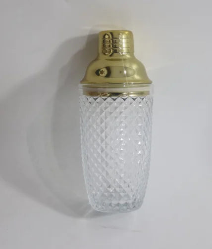 Durable glass cocktail shaker with leak-proof lid, ideal for bartenders and home enthusiasts mixing drinks.