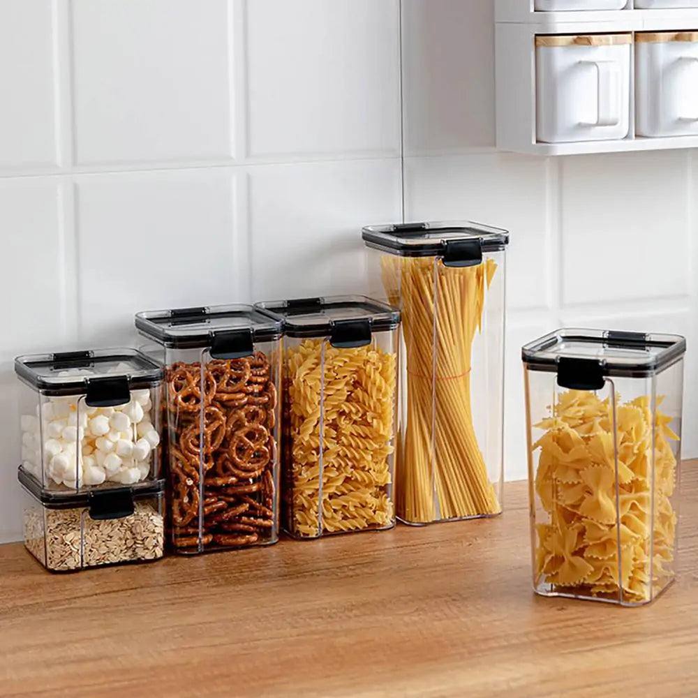 Set of airtight plastic pantry containers with plastic lids, perfect for storing cereals, snacks, and kitchen staples.