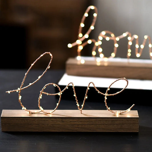 Personalized neon LED letter lights, battery-operated Home and Love display for cozy living spaces.