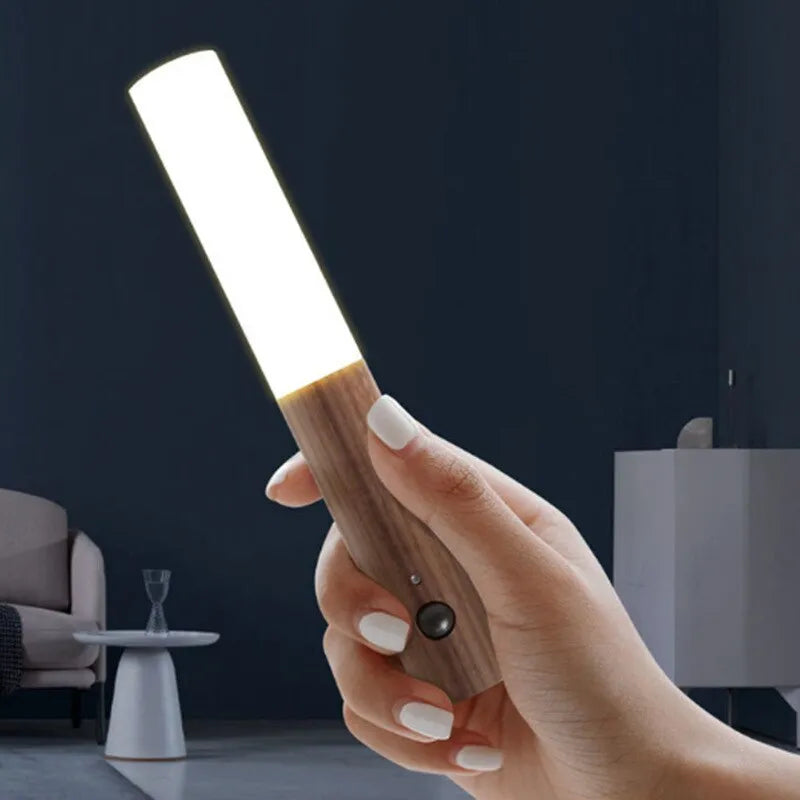 Battery-powered LED wall lamp with wireless motion detection, magnetic wooden beam, photosensitive sensor, and USB charging