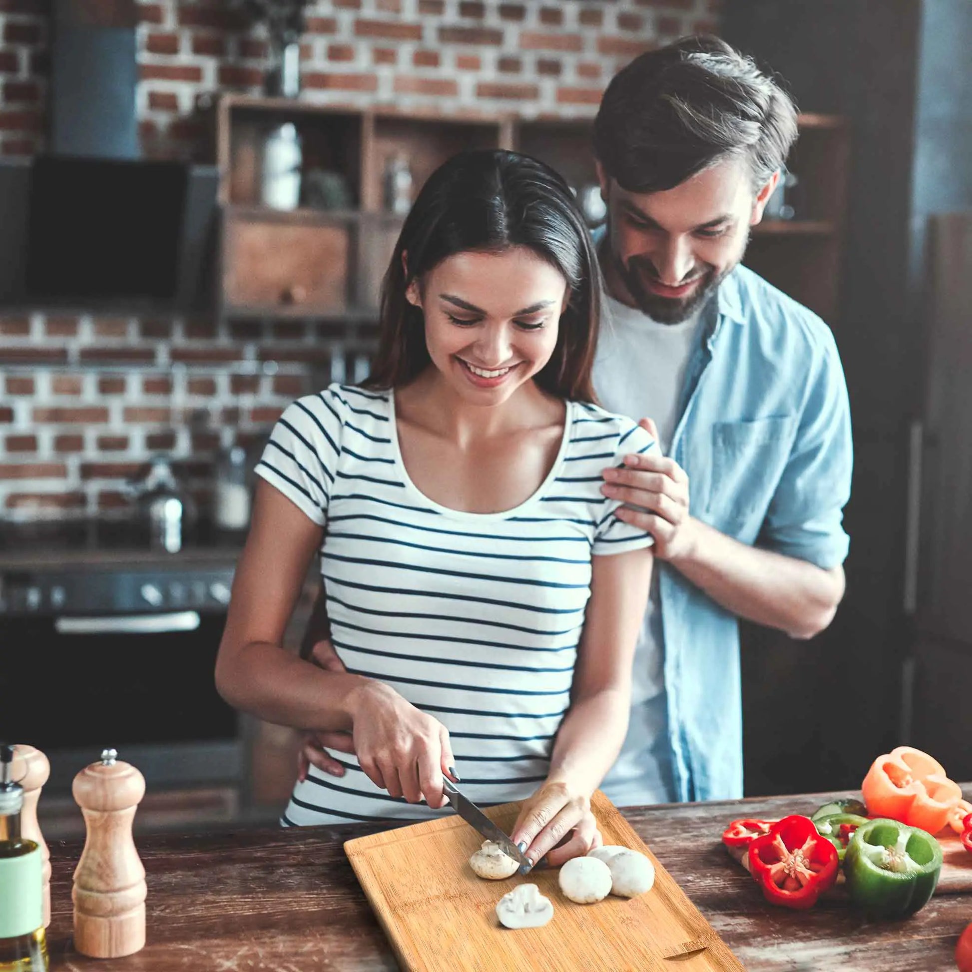 Premium bamboo cutting board, oversized wooden surface with juice groove, perfect for meal preparation.